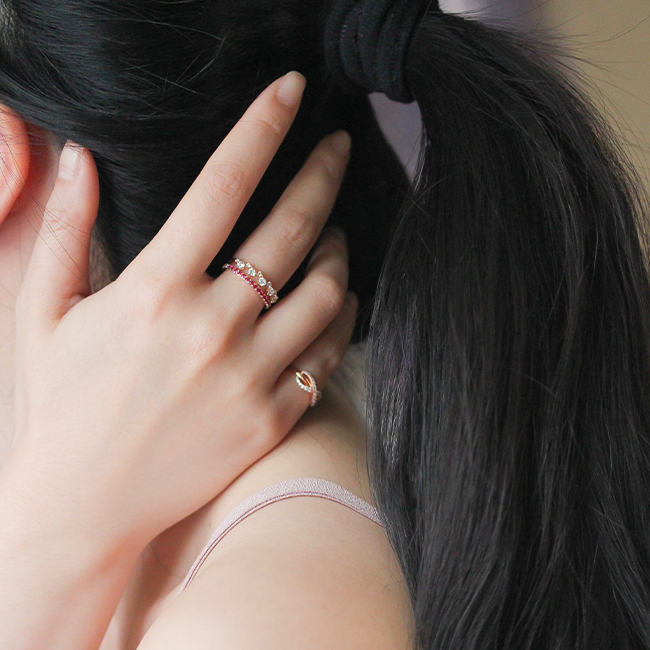Pink sapphire half eternity ring